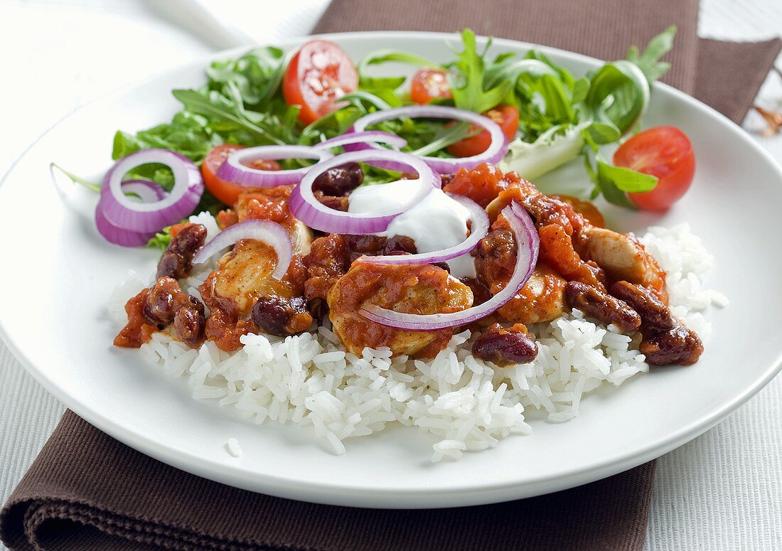 Hähnchenchili mit Tacosauce auf Reis