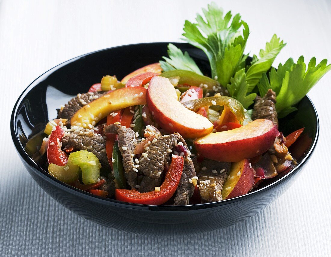 Beef salad with peaches and peppers