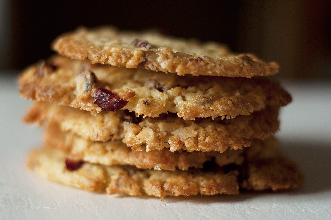 A stack of walnut and cranberry biscuits