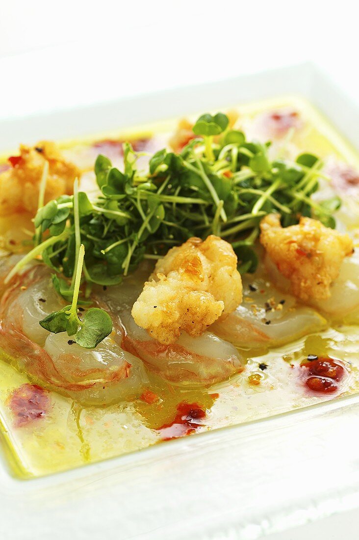 Raw and fried crayfish on a lime and chilli marinade with cress salad