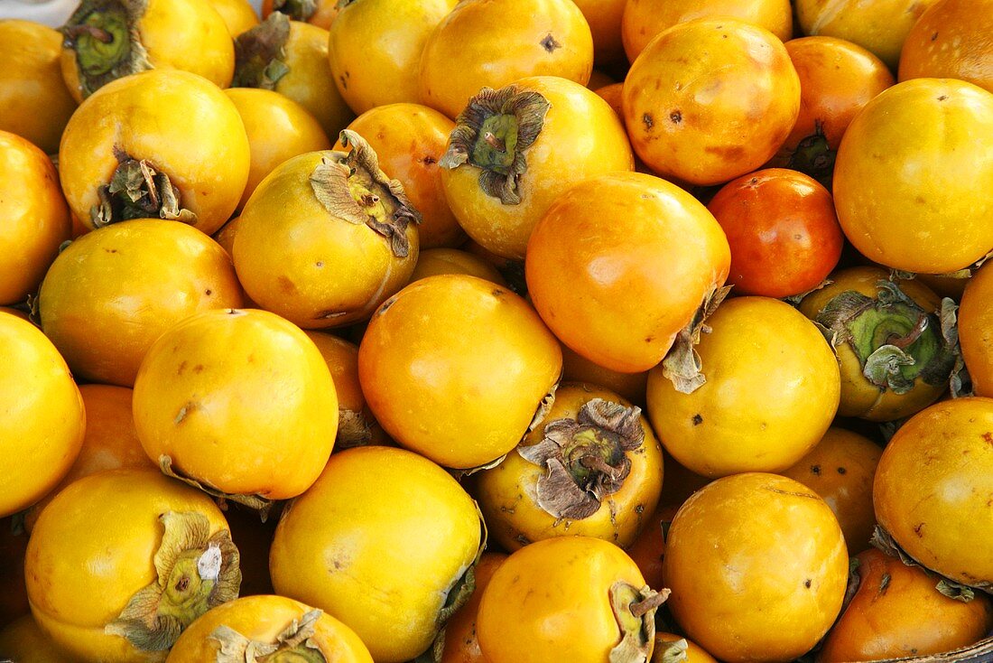 Persimmons at a Market