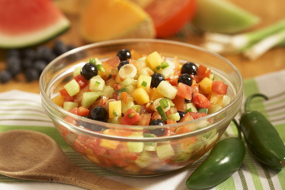 Bowl of Fruit Salad with Watermelon, Grape, Mango, Melon and Green Onion