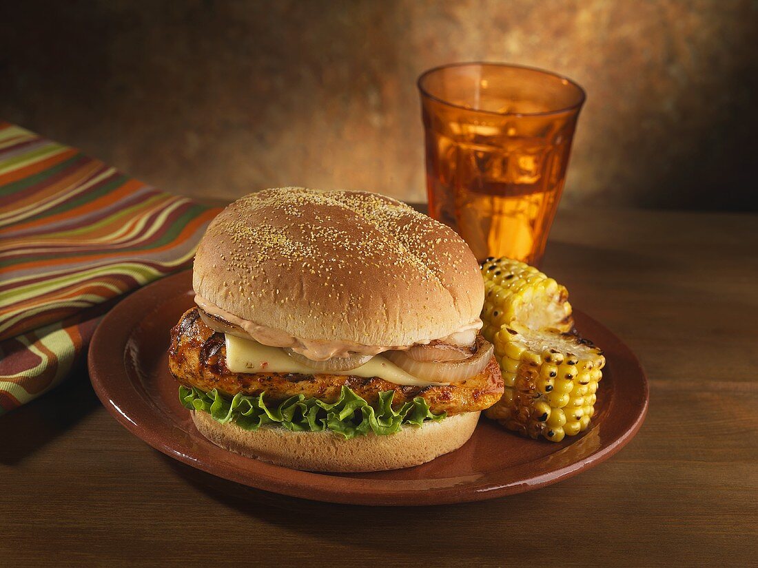 Chipotle Grilled Chicken Sandwich with Pepper Jack Cheese and Onions; Grilled Corn on the Cob