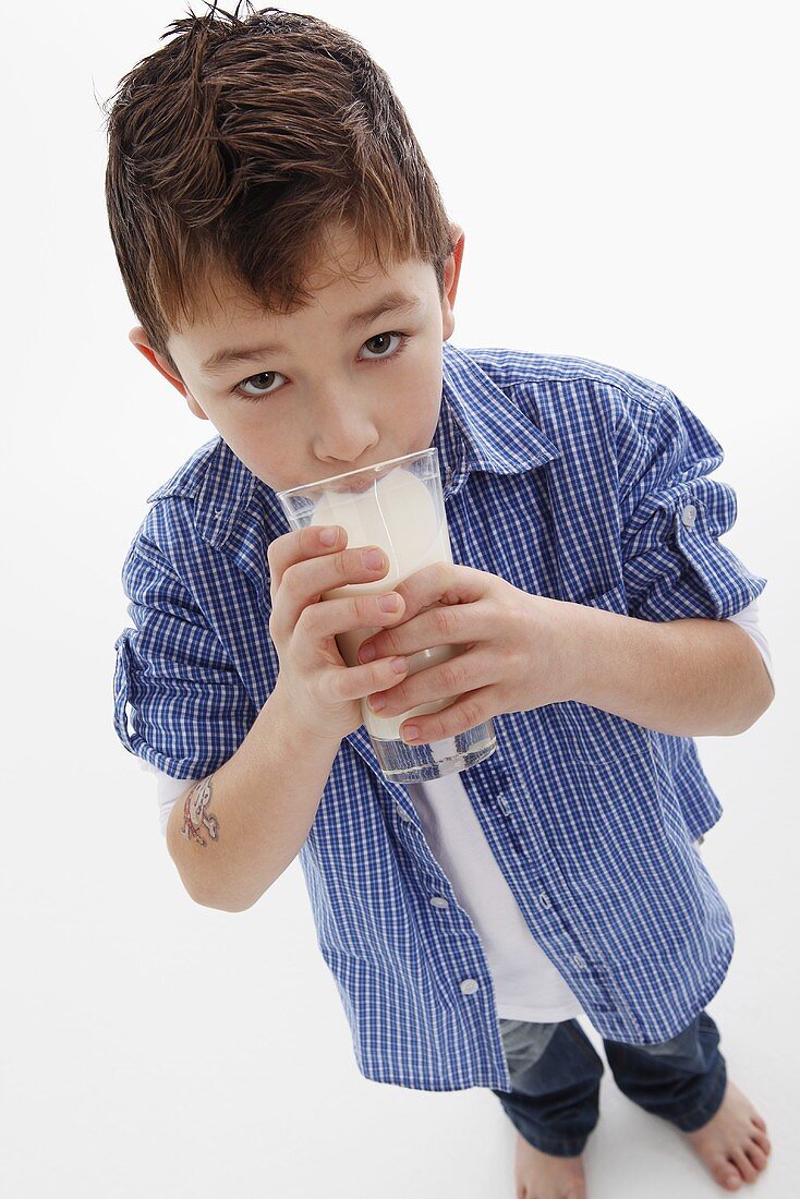 Little boy drinking milk