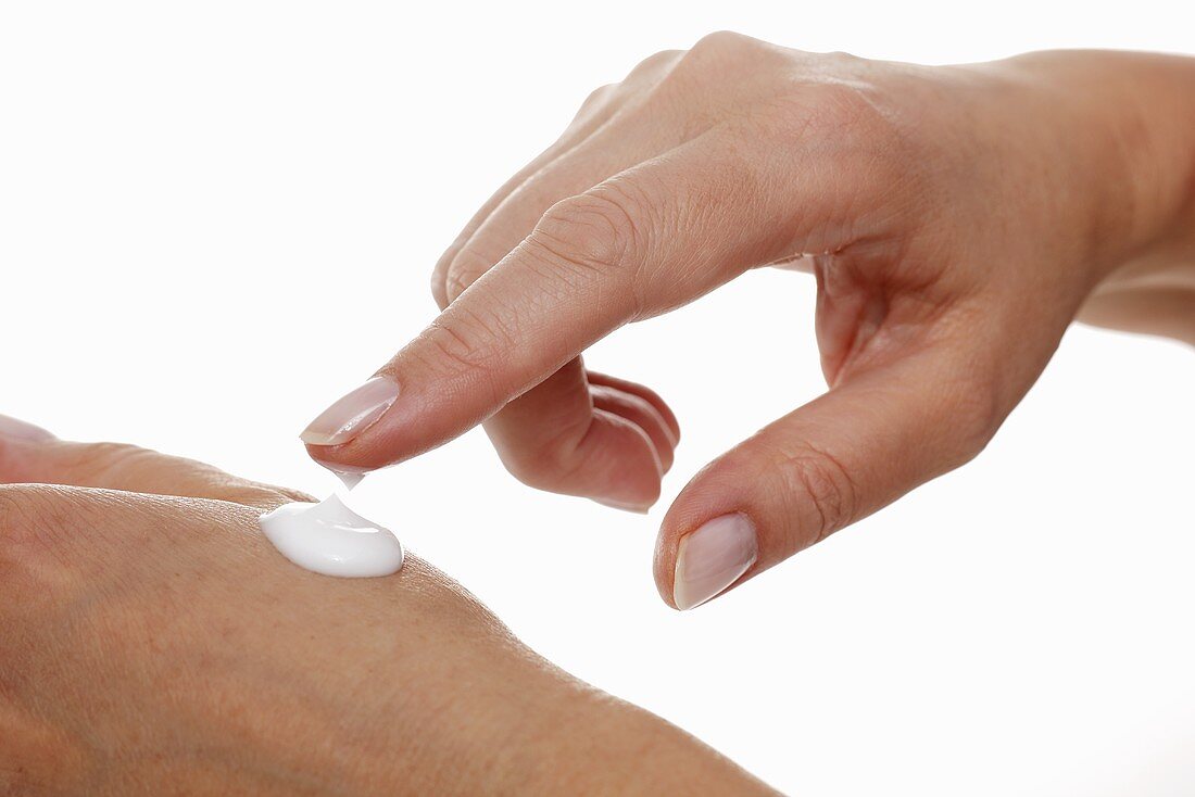 A hand with hand cream