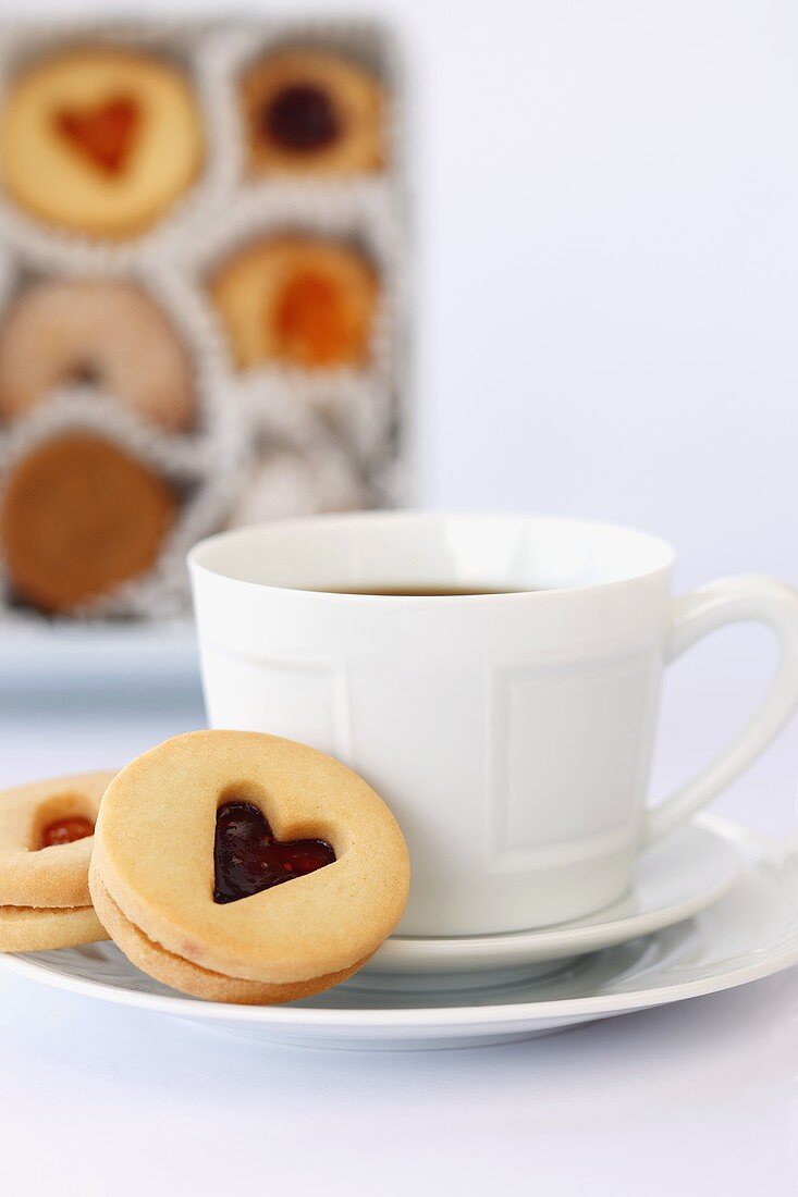 Linzer Tart Cookies with a Cup of Coffee