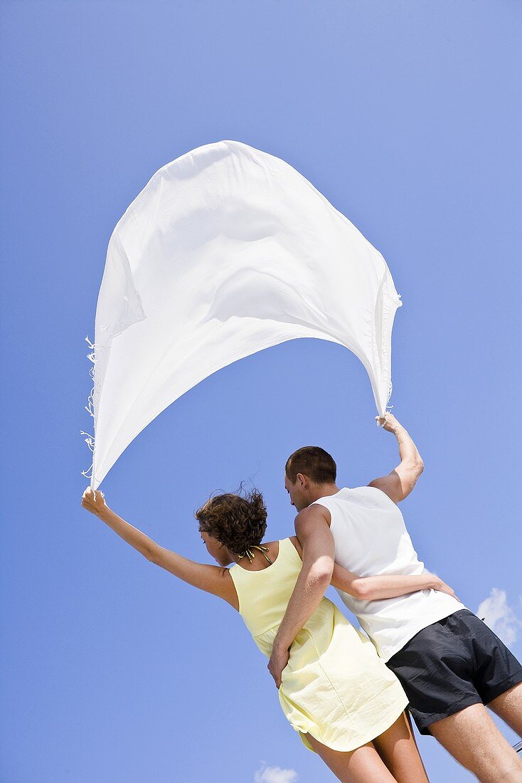 Couple with a sail