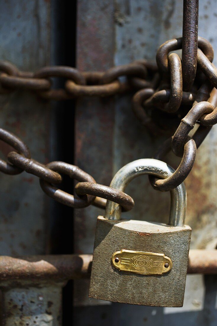 Lock on a rusty chain