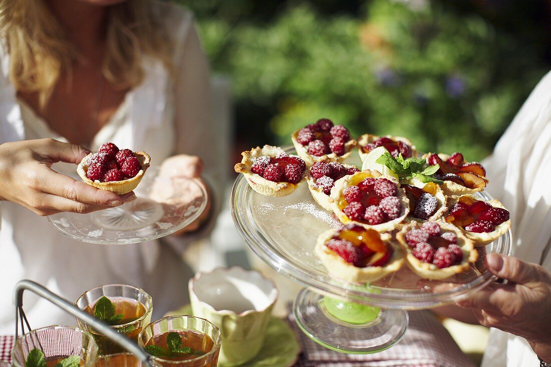 Berry tarts and ice tea in the garden