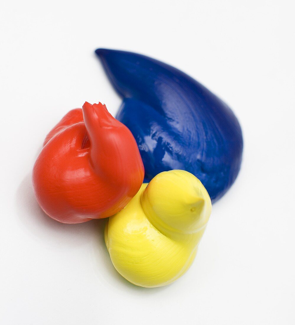 Paint blobs in yellow, blue and orange
