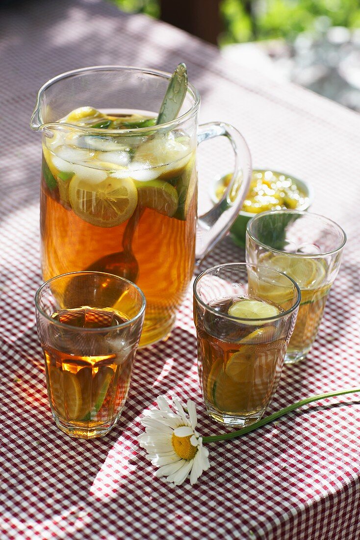 Ice tea with lemon and ice cubes