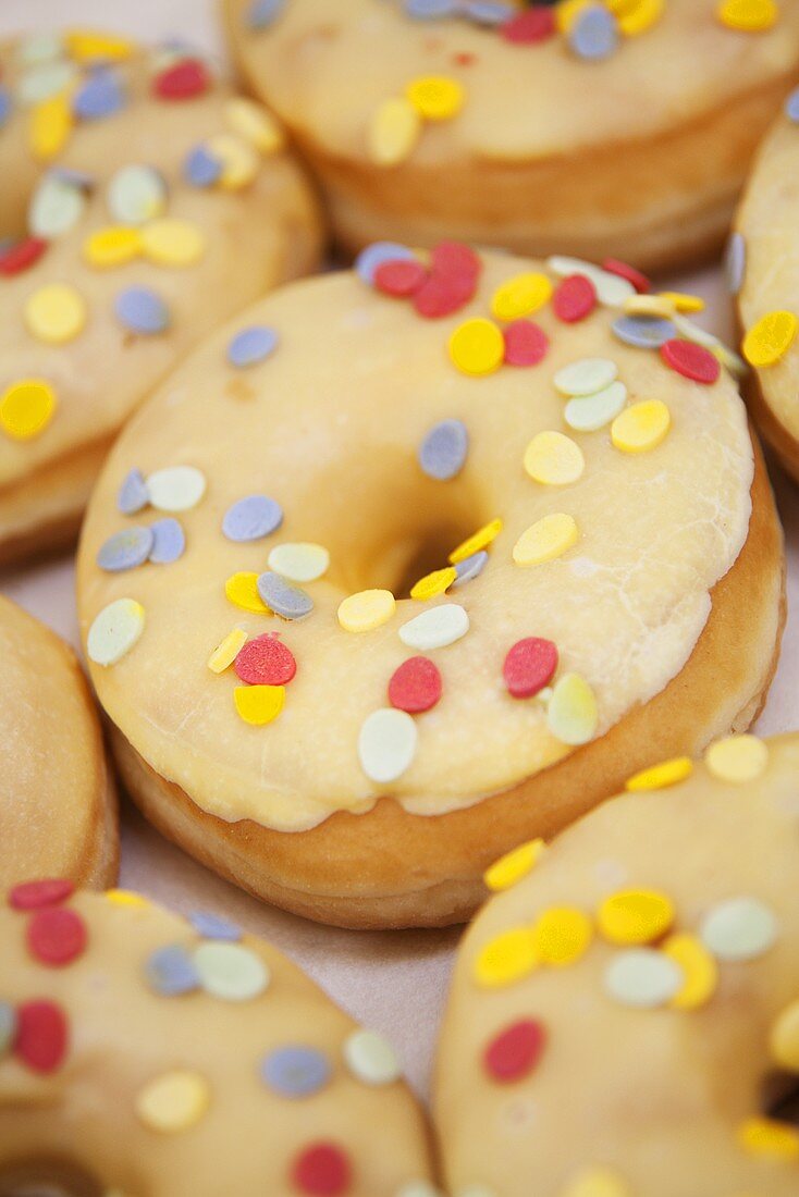 Iced donuts with confetti sprinkles