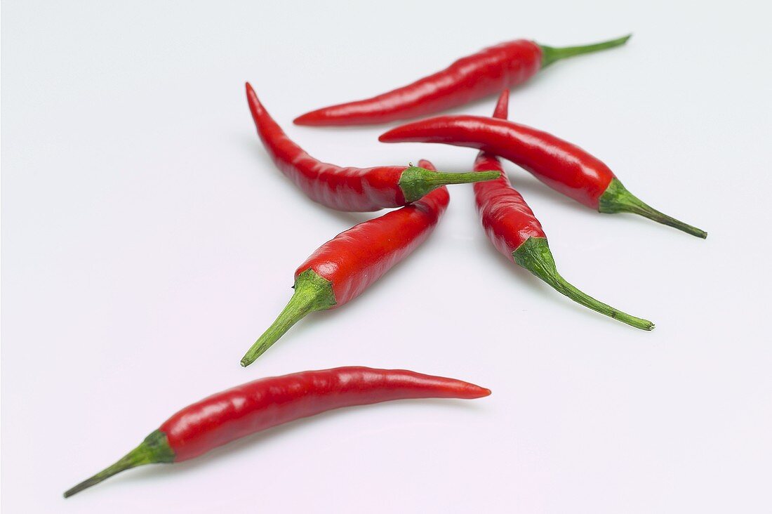 Several fresh red chillies