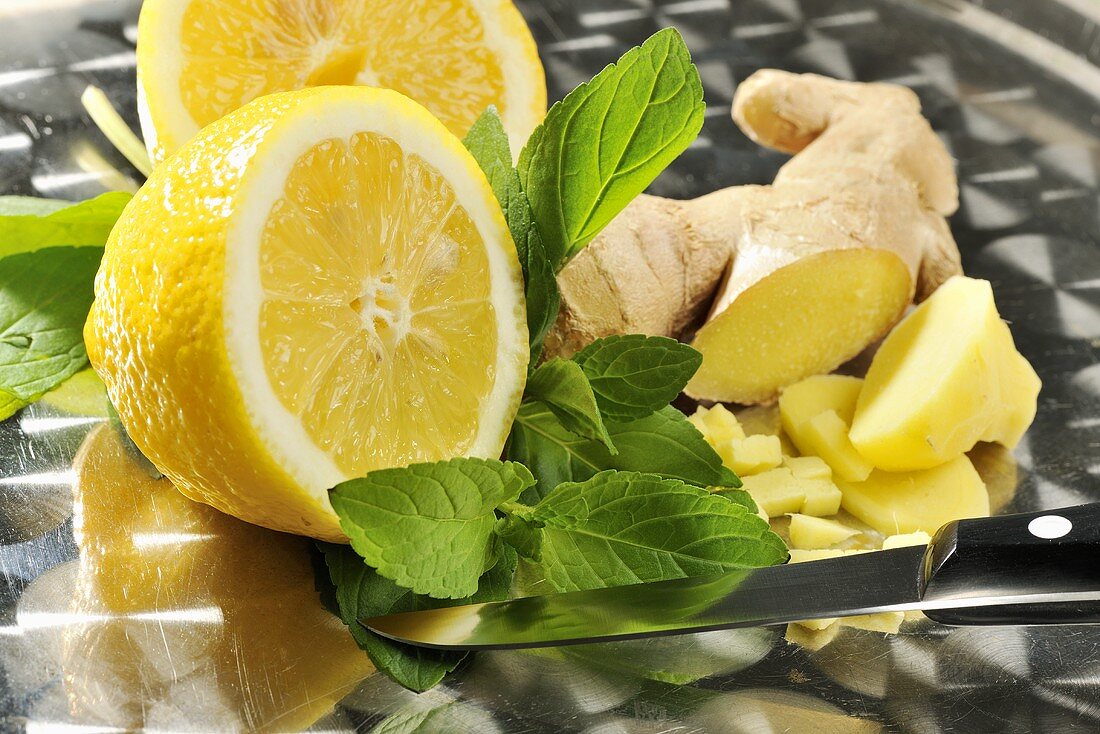 Ingredients with lemon and ginger lemonade (lemons, ginger, mint)