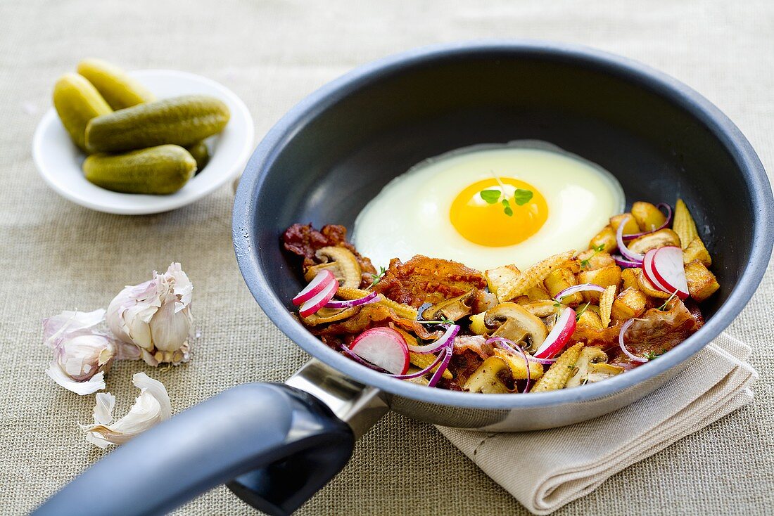 A farmer's breakfast with fried potatoes and a fried egg