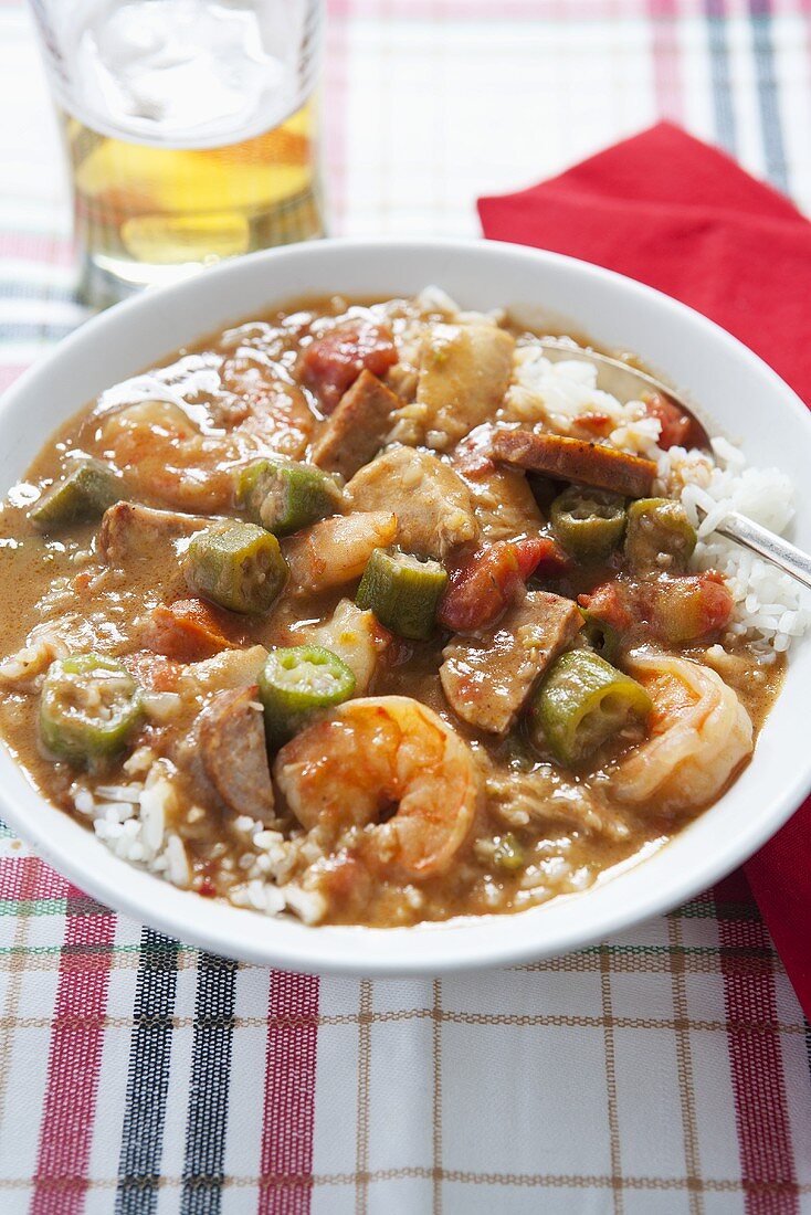 Bowl of Shrimp Gumbo Over Rice; On Table