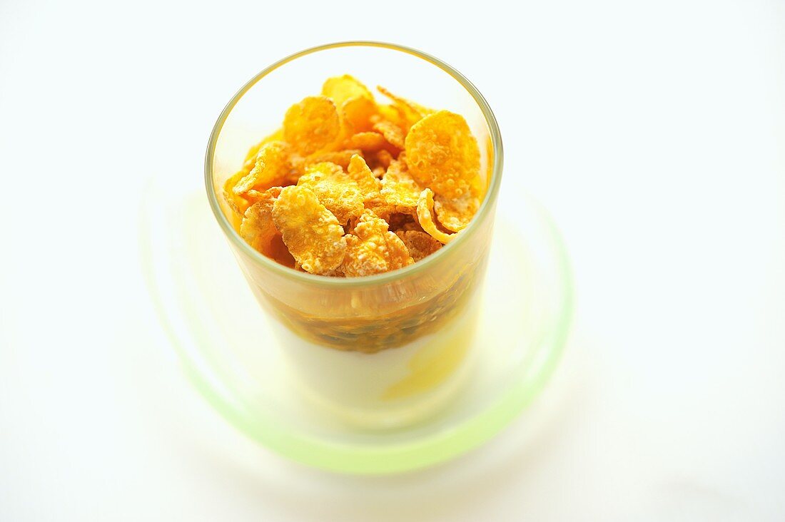 Yogurt with passion fruit and cornflakes