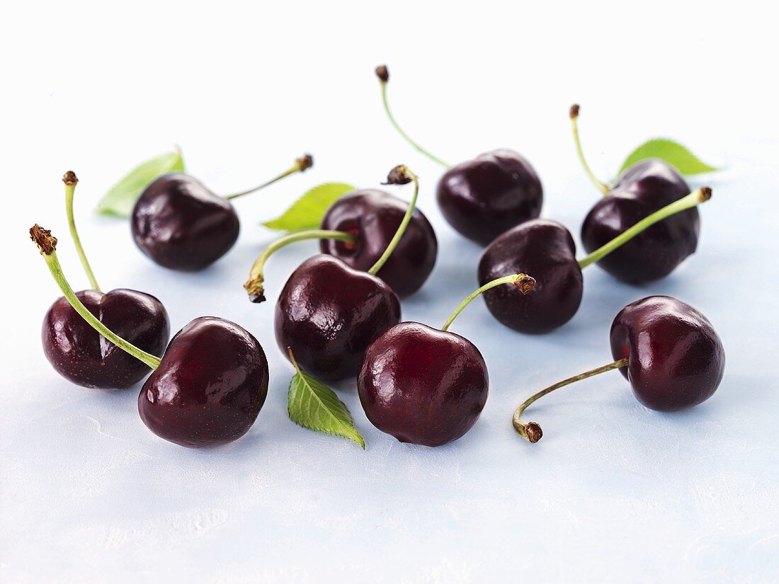 Fresh cherries with stem and leaves