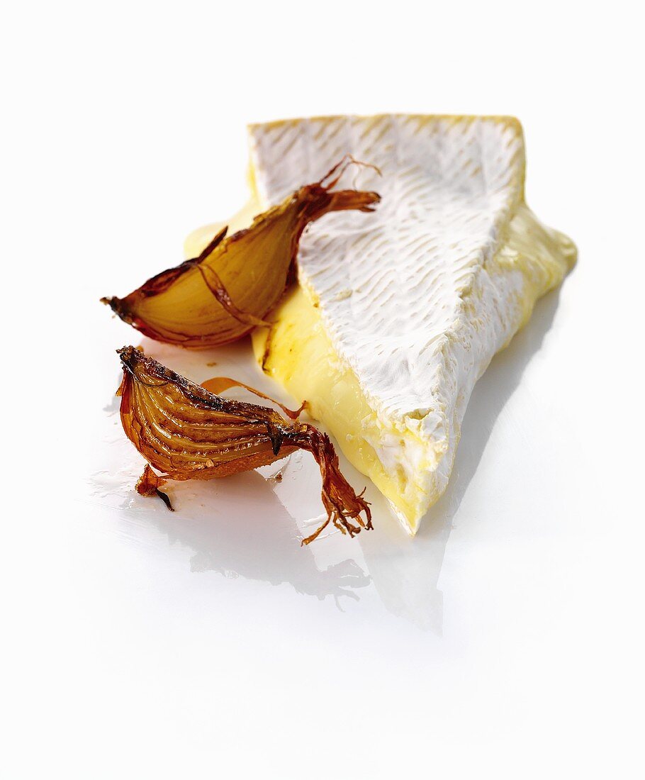 A slice of Brie and caramelised onions