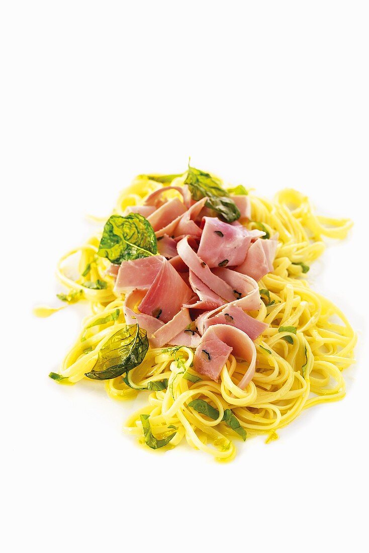 Ribbon noodles with ham, basil and truffles