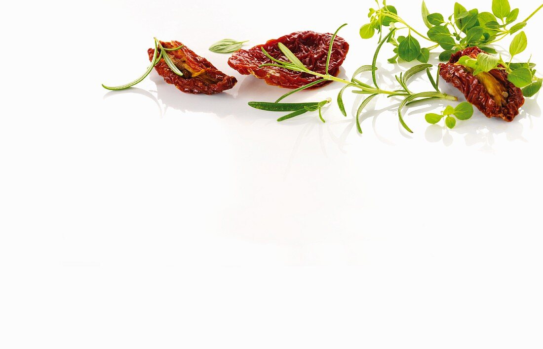 Dried tomatoes and various herbs