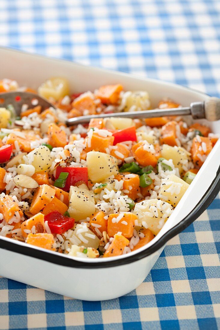 Caribbean style rice salad with sweet potatoes, peppers and jicama