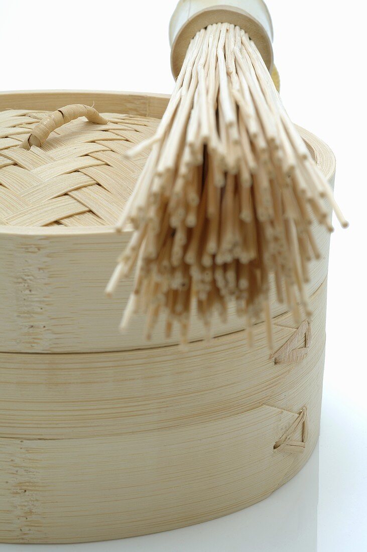 Bamboo baskets with bamboo whisk