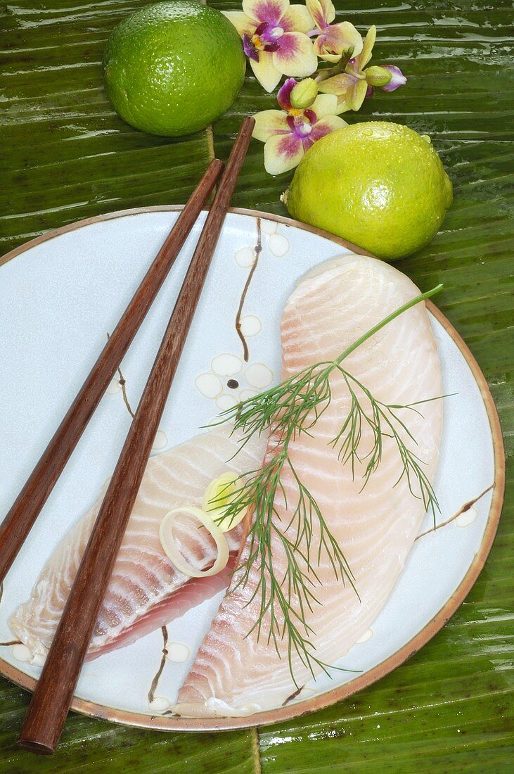 Fish fillets, dill and limes