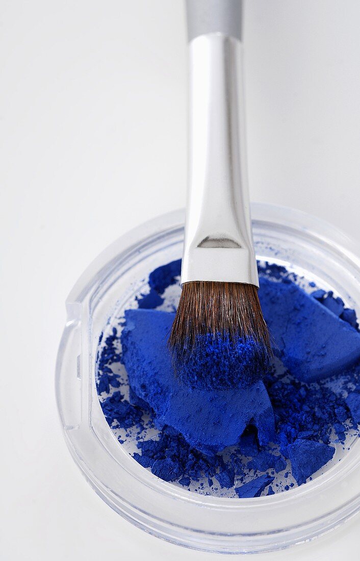 Blue powder with brush