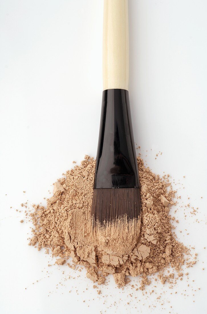 Beige powder with brush