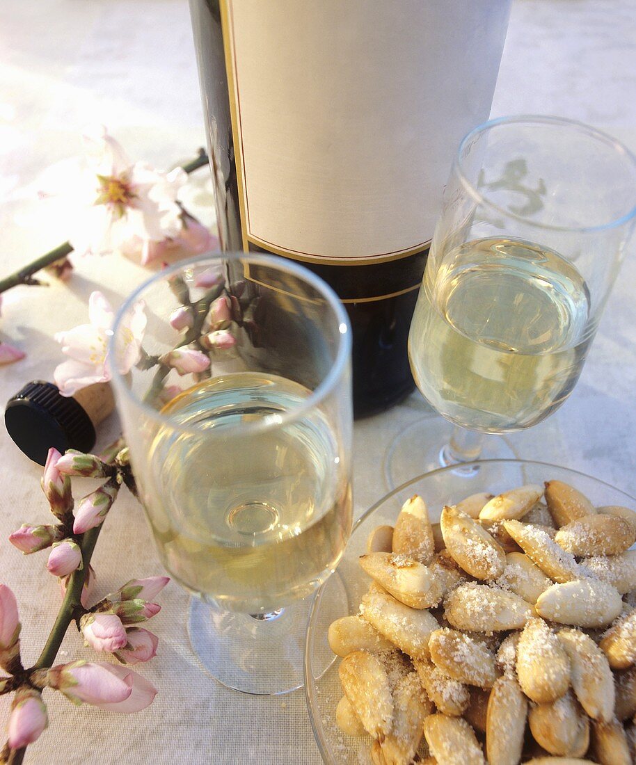 Almonds with grated cheese, white wine