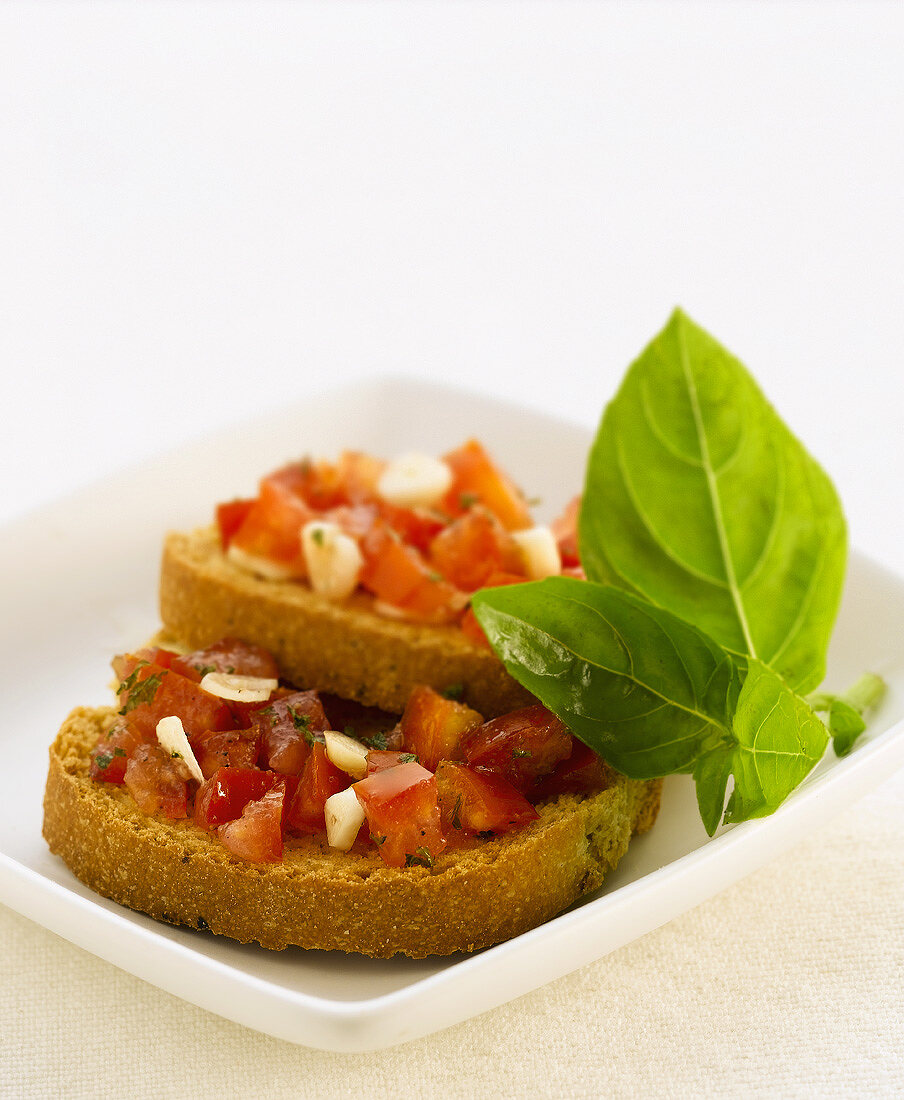 Two bruschetta with tomato salsa