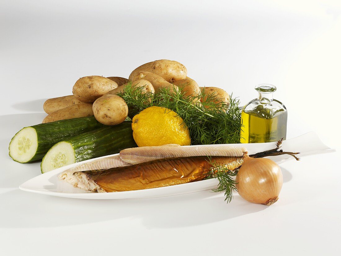 Ingredients for fried potatoes with smoked fish