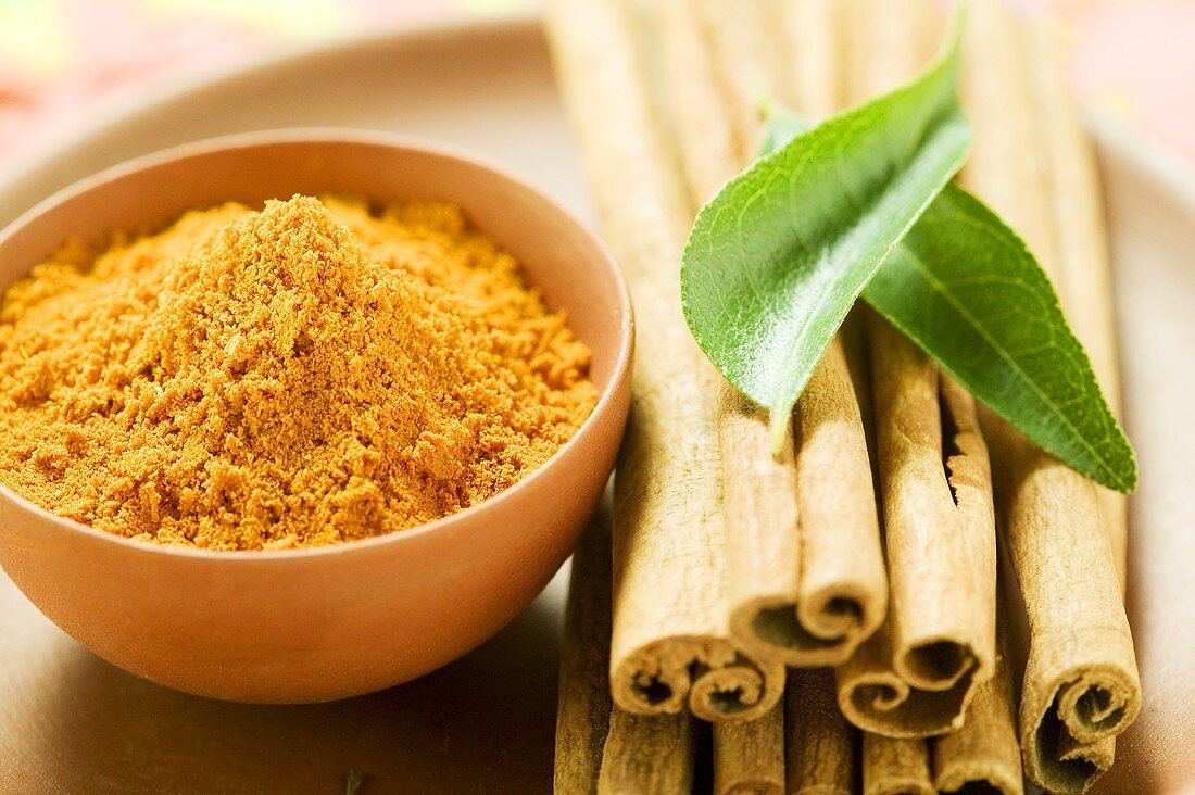 Cinnamon sticks, curry leaves and curry powder