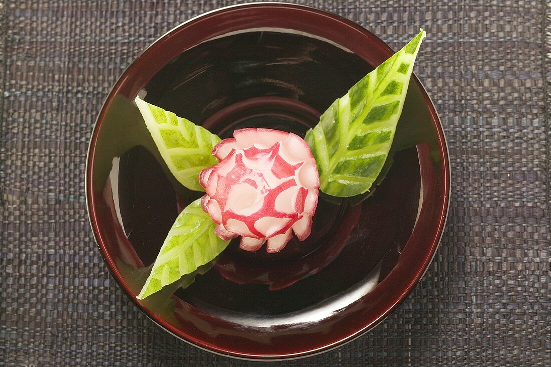 Radish flower and carved cucumber leaves