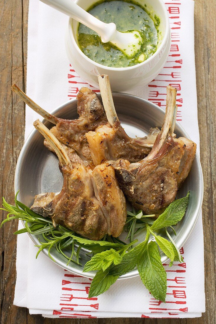 Grilled lamb cutlets, fresh herbs, herb sauce