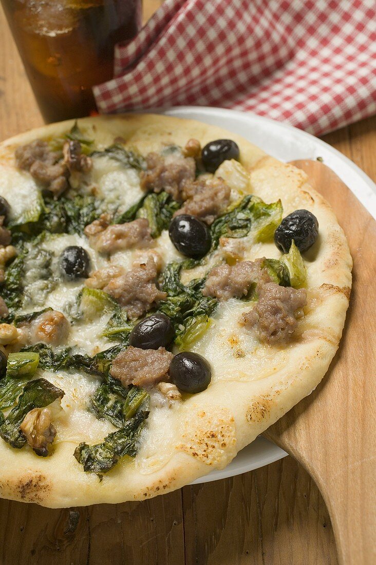 Pizza with tuna, chard and olives
