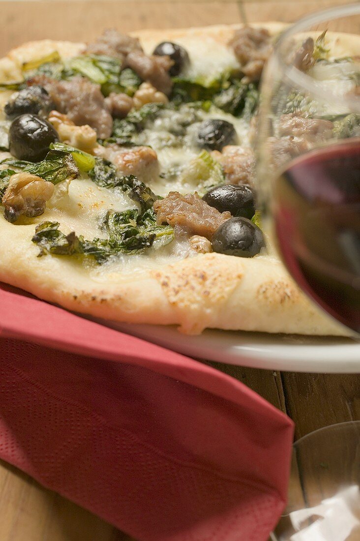 Pizza with tuna, chard and olives