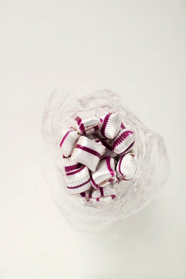 Cherry mint sweets in plastic bag