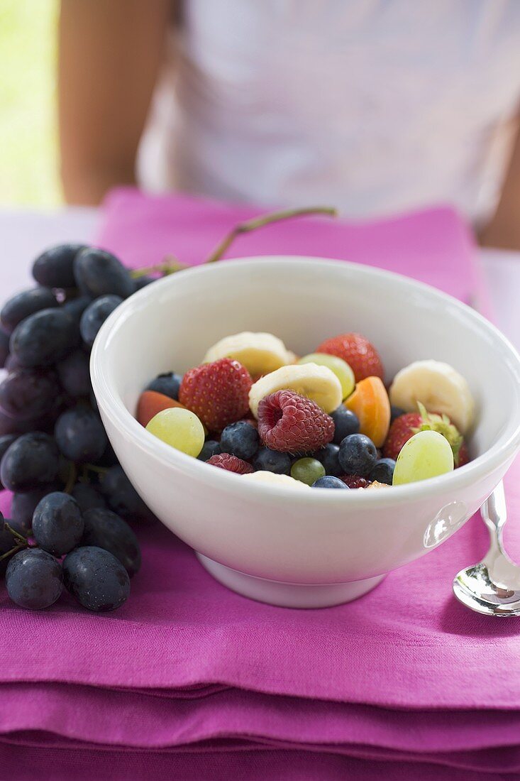 Fruit muesli on table in the open air