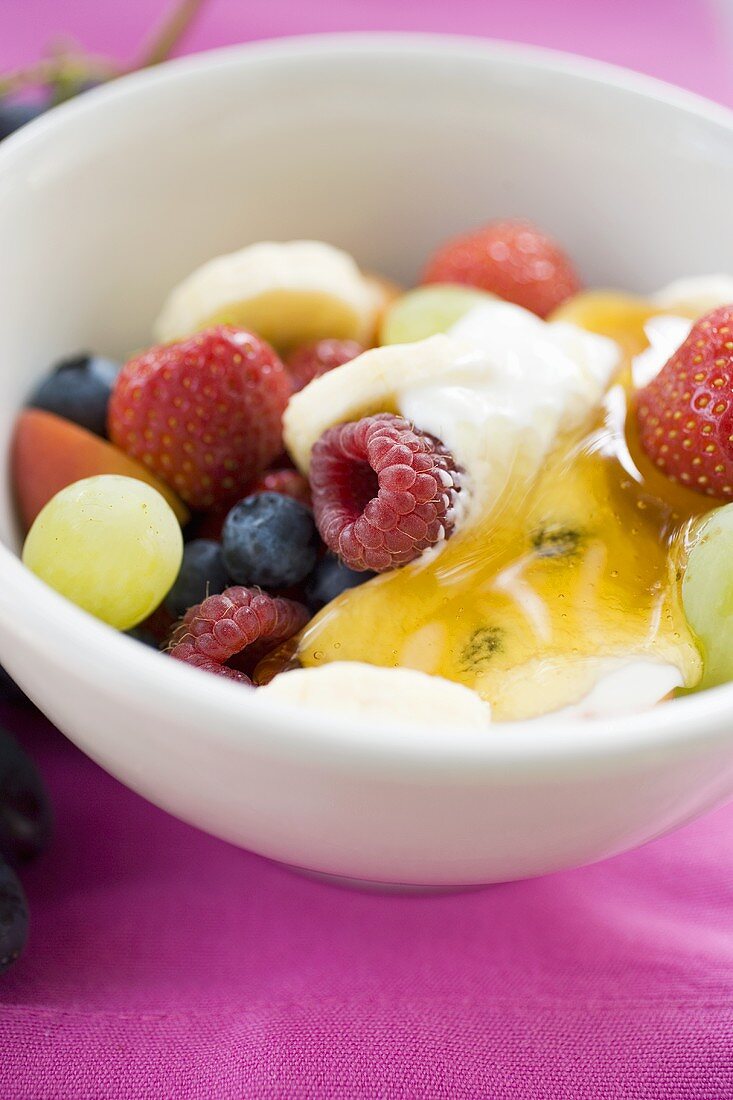 Fruit muesli with yoghurt and honey