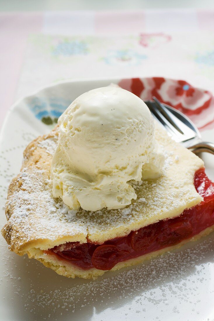 Piece of cherry pie with vanilla ice cream (USA)