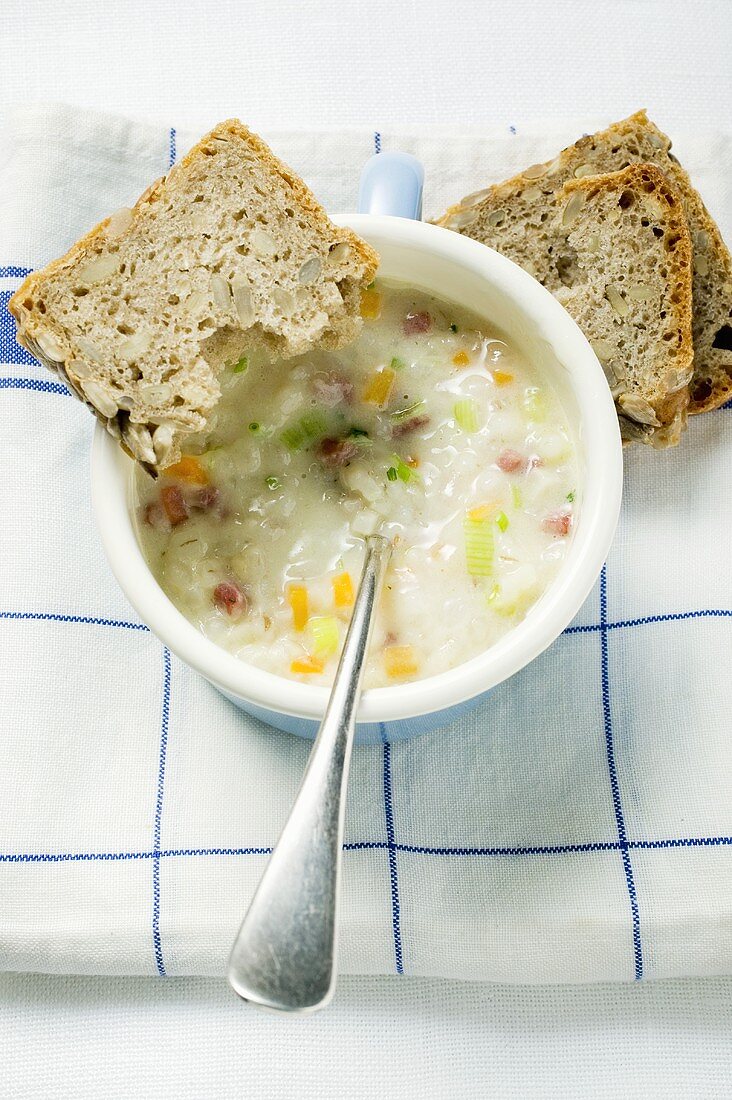 Barley soup with bacon and bread