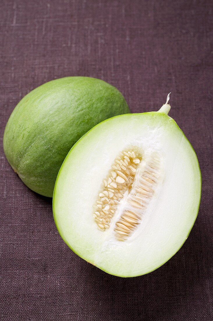 Green honeydew melon, halved
