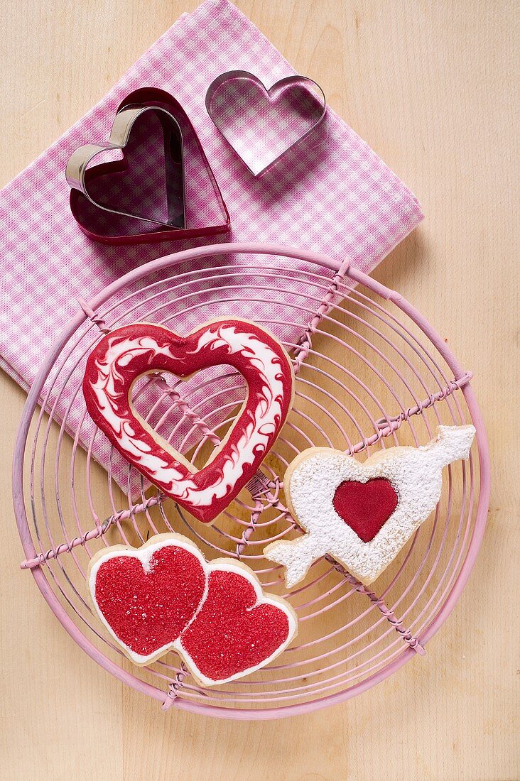 Heart-shaped biscuits on cake rack for Valentine's Day