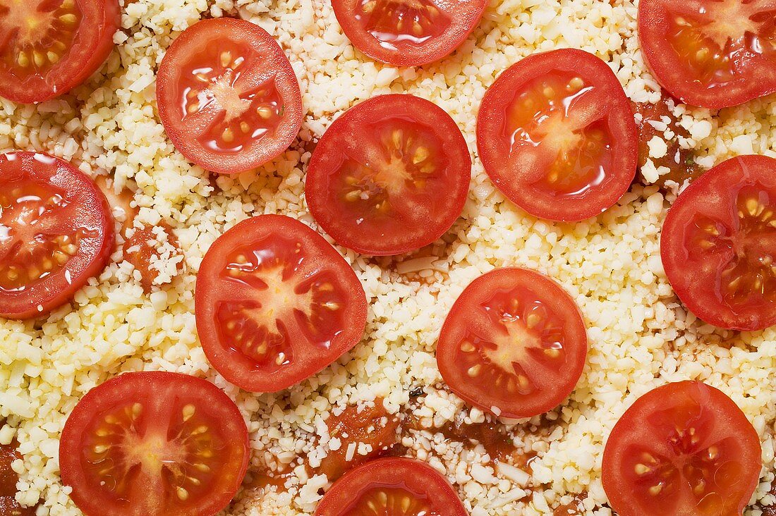 Cheese and tomato pizza (unbaked), full-frame