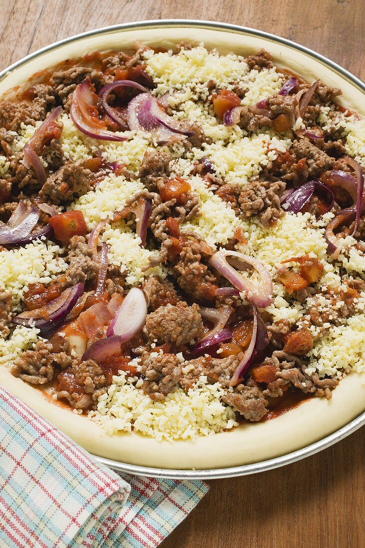 Mince and onion pizza with cheese (unbaked)