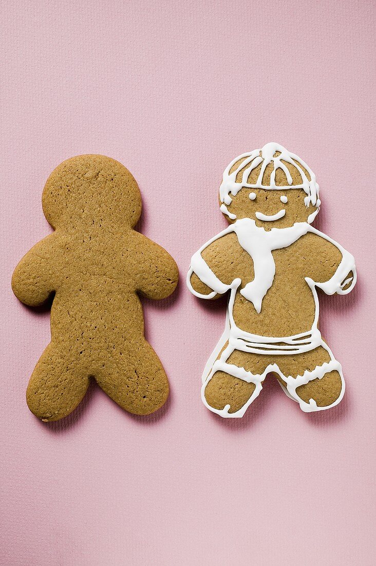 Two gingerbread men, one plain and one iced