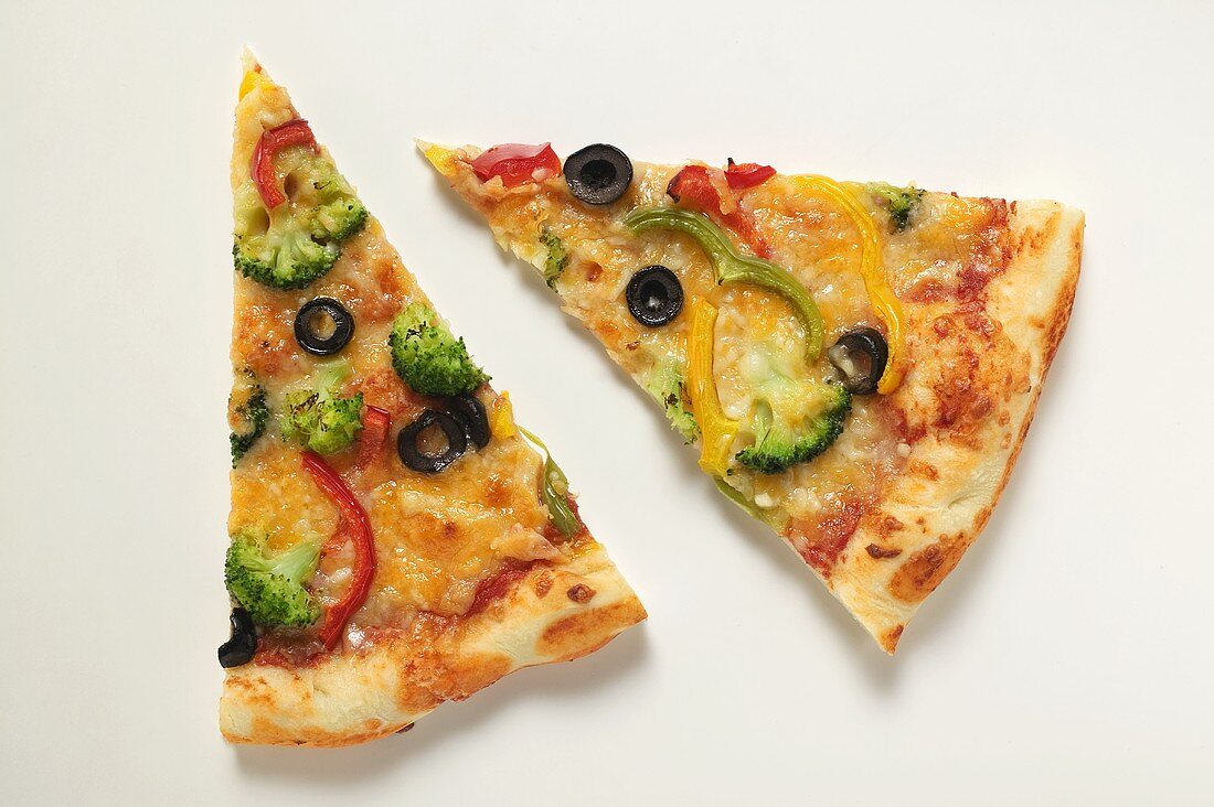 Two slices of American-style vegetable pizza