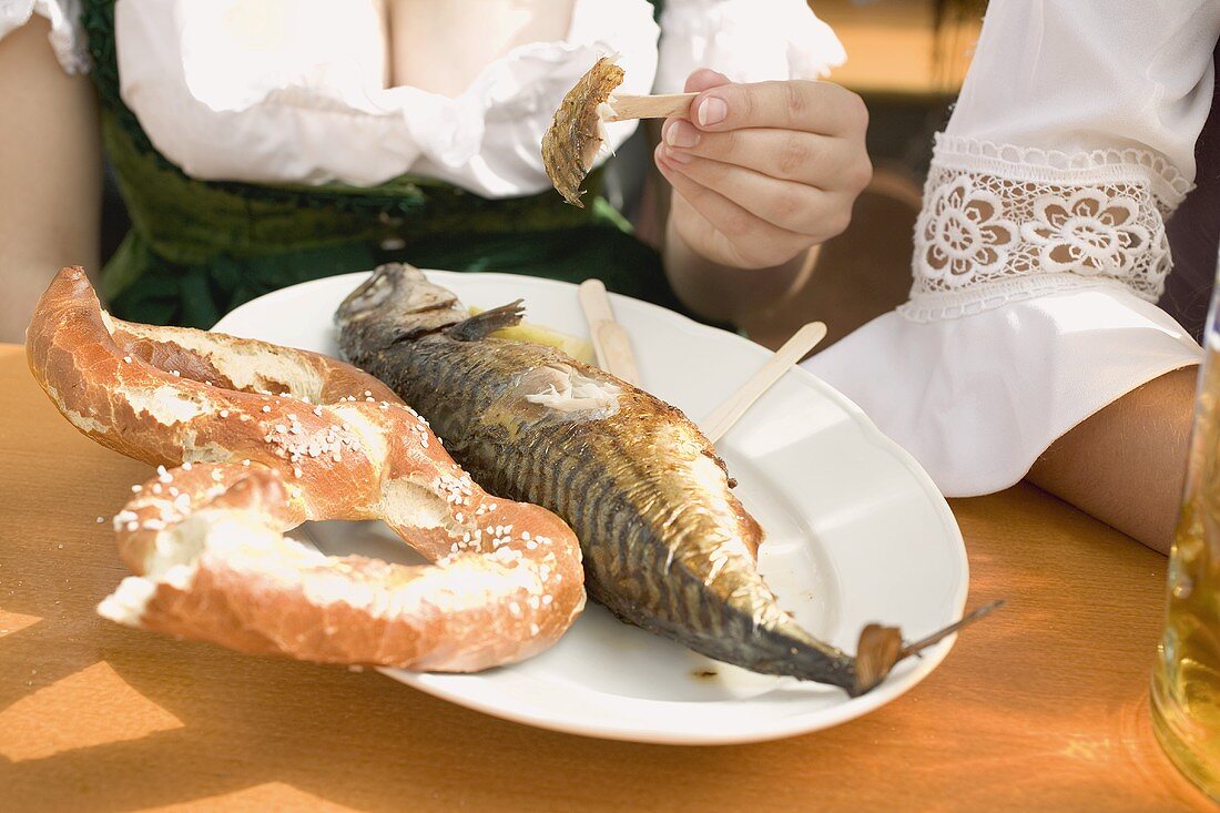 Steckerlfisch (fish on stick) & pretzel (Oktoberfest, Munich)